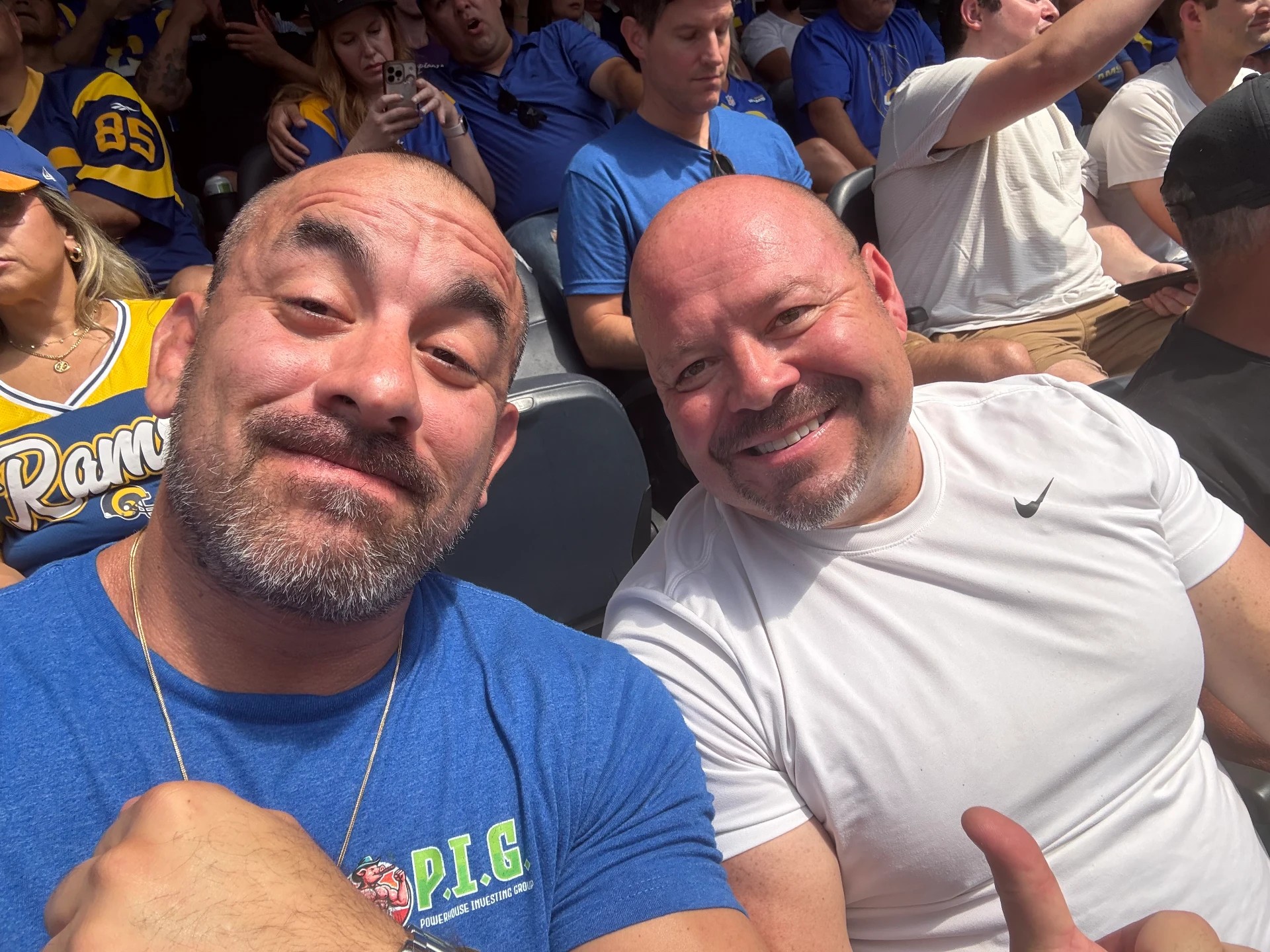 P.I.G. members in P.I.G. gear at a Rams game
