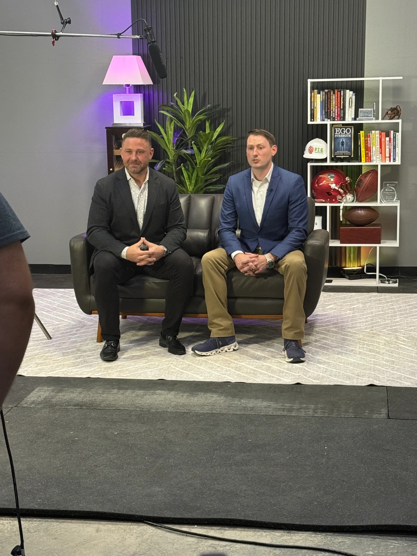 P.I.G. members filming a studio interview